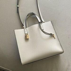 Marc Jacobs Mini Grind tote. Lots of life left but handles show definite usage.